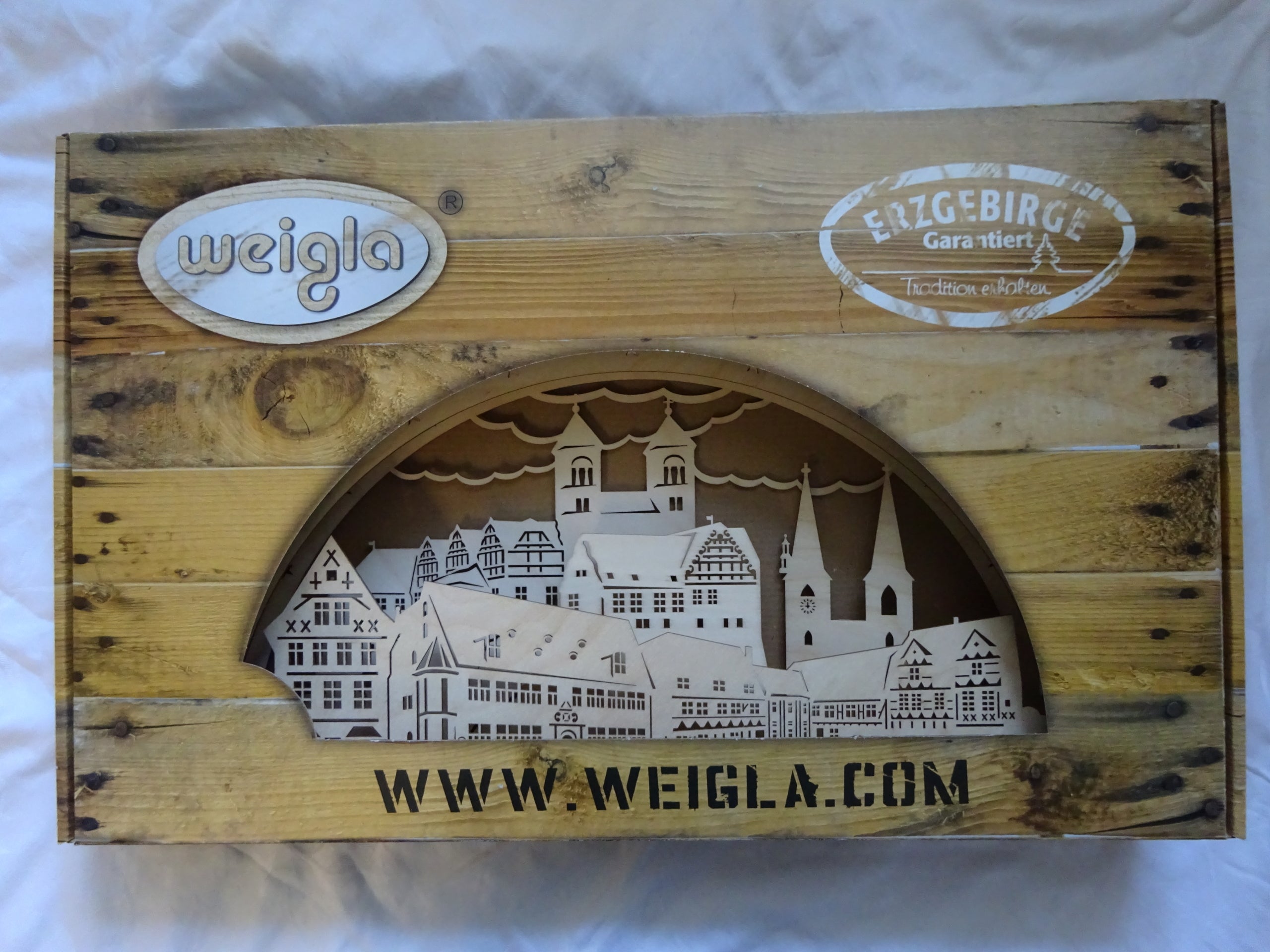 Beleuchteter Schwibbogen mit Quedlinburg-Motiv – handwerkliche Weihnachtsdekoration mit Licht, ideal als Geschenk.