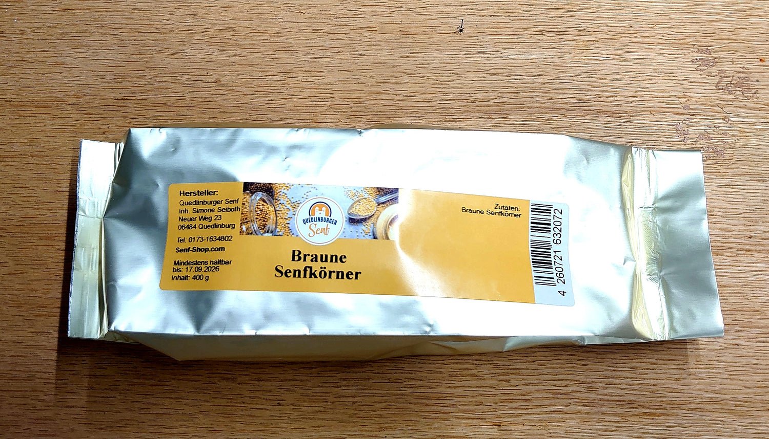 Tüte mit braunen Senfkörnern