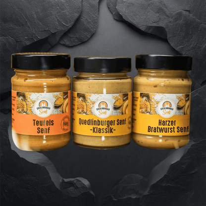„Klassik-Senf Allrounder im Maxi-Glas 190 ml – Quedlinburger Senf“
„Bratwurst-Senf herzhaft im Maxi-Glas 190 ml – Quedlinburger Senf“
 „Teufels-Senf würzig-scharf im Maxi-Glas 190 ml – Quedlinburger Senf